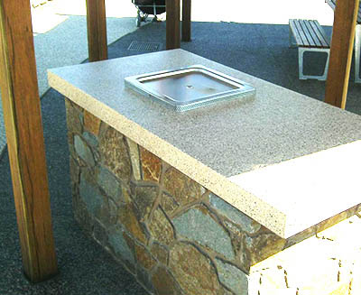 Polished concrete table and BBQ top made by SVC Products