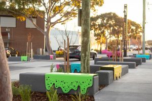 Charcoal seats with splashes of brightly-coloured steel detailing.