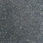 Charcoal concrete swatch featuring light coloured pebbles