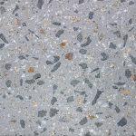 Mid-grey concrete swatch featuring large chunks of stone aggregates