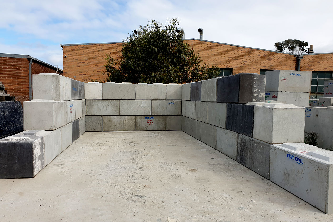 Repurposing waste concrete as building blocks